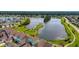 Aerial shot showcasing community lake and lush landscaping at 1171 Hammrick Ln, Johns Island, SC 29455