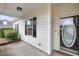 Covered entry with decorative front door and dark shutters at 1171 Hammrick Ln, Johns Island, SC 29455