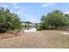 A picturesque view of the lake from the backyard, showcasing the tranquil waterfront setting at 1171 Hammrick Ln, Johns Island, SC 29455
