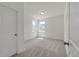 Bright bedroom with soft carpet and two windows to let in natural light at 120 Shingle Oak Dr, Moncks Corner, SC 29461