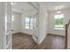 Bright entryway with hardwood floors, glass french doors, and natural light at 120 Shingle Oak Dr, Moncks Corner, SC 29461
