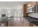 Modern kitchen featuring stainless steel appliances and large center island with seating at 120 Shingle Oak Dr, Moncks Corner, SC 29461