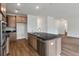 Stylish kitchen with granite island, stainless steel appliances, and ample cabinet space at 120 Shingle Oak Dr, Moncks Corner, SC 29461