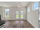 Bright living room with hardwood floors and double glass doors to let in natural light at 120 Shingle Oak Dr, Moncks Corner, SC 29461
