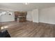 Spacious open-concept living room and kitchen featuring hardwood floors and natural light at 120 Shingle Oak Dr, Moncks Corner, SC 29461