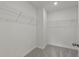 Walk-in closet with carpet flooring and ample shelving at 120 Shingle Oak Dr, Moncks Corner, SC 29461