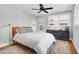 Cozy bedroom featuring a patterned comforter, ceiling fan, and plenty of natural light at 1251 Charlestowne Dr, Charleston, SC 29407