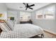 Comfortable bedroom with a fan, and an exterior door with access to the yard at 1251 Charlestowne Dr, Charleston, SC 29407