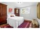 Cozy bedroom with hardwood floors, natural light, and vintage decor, with neutral palette at 1251 Charlestowne Dr, Charleston, SC 29407