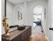 Hallway leads to the bedroom and features a large mirror and stylish decor at 1251 Charlestowne Dr, Charleston, SC 29407