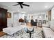 Open concept living space with hardwood floors connecting the living room and kitchen at 1251 Charlestowne Dr, Charleston, SC 29407