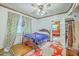 Comfortable bedroom with wood furnishings and bright natural light at 1259 Wisteria Rd, Charleston, SC 29407