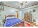 Comfortable bedroom with wood furnishings and bright natural light at 1259 Wisteria Rd, Charleston, SC 29407