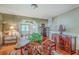 Traditional dining room with vintage wallpaper and hardwood floors at 1259 Wisteria Rd, Charleston, SC 29407