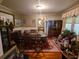 Traditional dining room with ample natural light and classic wallpaper at 1259 Wisteria Rd, Charleston, SC 29407