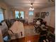 Inviting living room with a plush sofa, ceiling fan, and bright natural light at 1259 Wisteria Rd, Charleston, SC 29407