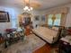 Cozy living room featuring a decorative ceiling fan and lots of decor at 1259 Wisteria Rd, Charleston, SC 29407