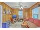 Cozy living room featuring wood paneling and a functional layout at 1259 Wisteria Rd, Charleston, SC 29407