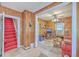 Cozy living room featuring wood paneling and a functional layout at 1259 Wisteria Rd, Charleston, SC 29407