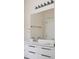 Well-lit bathroom showcasing a double sink vanity with modern fixtures and a large mirror at 1315 Palm Cove Dr, Charleston, SC 29492