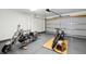 Garage showcasing two motorcycles, concrete floors, and ample space for parking and storage at 1315 Palm Cove Dr, Charleston, SC 29492