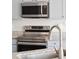 Kitchen with stainless steel appliances and granite countertops at 1315 Palm Cove Dr, Charleston, SC 29492