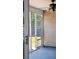 Enclosed screened-in porch with a ceiling fan and a view of the backyard at 1315 Palm Cove Dr, Charleston, SC 29492