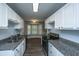 Modern kitchen with stainless steel appliances and granite countertops at 136 Harrow Pl, Goose Creek, SC 29445