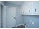 Mudroom area featuring convenient storage cabinets, a door to the outside and modern accents at 136 Harrow Pl, Goose Creek, SC 29445