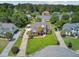 Stunning home with lush landscaping, a well-manicured lawn, and convenient driveway access, offering both beauty and practicality at 1503 Pondside Ct, Summerville, SC 29485