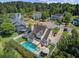 Expansive backyard includes a refreshing pool, well-kept lawn, and cozy patio, offering a serene and private outdoor retreat at 1503 Pondside Ct, Summerville, SC 29485