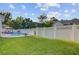 Fenced backyard with well-maintained lawn and a sparkling in-ground pool for relaxation and recreation at 1503 Pondside Ct, Summerville, SC 29485
