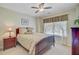 Cozy bedroom featuring neutral walls, ceiling fan, and comfortable furnishings at 1503 Pondside Ct, Summerville, SC 29485