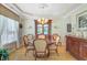 Formal dining room with hardwood floors, elegant chandelier, and classic decor at 1503 Pondside Ct, Summerville, SC 29485