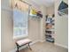Walk-in closet with shelving and window for natural lighting at 1503 Pondside Ct, Summerville, SC 29485