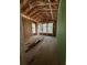 Unfinished bedroom featuring large windows, highlighting natural light and offering a serene view of the outdoors at 1519 John Fenwick Ln, Johns Island, SC 29455