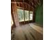 Unfinished bedroom featuring large windows, highlighting natural light and offering a serene view of the outdoors at 1519 John Fenwick Ln, Johns Island, SC 29455