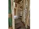 Unfinished hallway displaying the framework, offering a glimpse into the home's layout and design potential at 1519 John Fenwick Ln, Johns Island, SC 29455