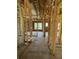 Unfinished hallway displaying the framework, offering a glimpse into the home's layout and design potential at 1519 John Fenwick Ln, Johns Island, SC 29455
