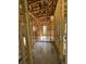Unfinished hallway displaying the framework, offering a glimpse into the home's layout and design potential at 1519 John Fenwick Ln, Johns Island, SC 29455