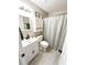 Bright bathroom featuring a modern vanity, mirror, and patterned shower curtain at 1534 Kentwood Cir, Charleston, SC 29412