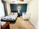 Shot of Bedroom with crib, full bed, dresser, and accent wall at 1534 Kentwood Cir, Charleston, SC 29412