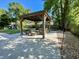 Covered patio with outdoor furniture, great for entertaining and relaxation at 1534 Kentwood Cir, Charleston, SC 29412