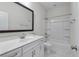 A clean, well-lit bathroom with a vanity, mirror, and shower-tub combo for everyday use at 1610 Fishbone Dr, Johns Island, SC 29455