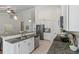 Open kitchen featuring stainless steel appliances, granite countertops, and white cabinetry at 1610 Fishbone Dr, Johns Island, SC 29455