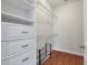 Spacious walk-in closet with custom shelving and storage solutions at 1610 Fishbone Dr, Johns Island, SC 29455