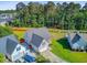 Aerial view featuring the property's manicured lawn, roof, and driveway at 168 Cotillion Cres, Summerville, SC 29483