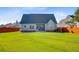 Expansive backyard featuring a screened porch, patio, and a privacy fence at 168 Cotillion Cres, Summerville, SC 29483