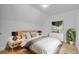 Cozy bedroom with a modern bed frame and stylish decor, perfect for relaxation at 168 Cotillion Cres, Summerville, SC 29483