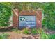 The brick entrance to Southern Magnolias, a welcoming community with a charming magnolia emblem at 168 Cotillion Cres, Summerville, SC 29483